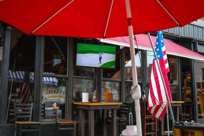 Outdoor dining and golf on TV in Bay Ridge